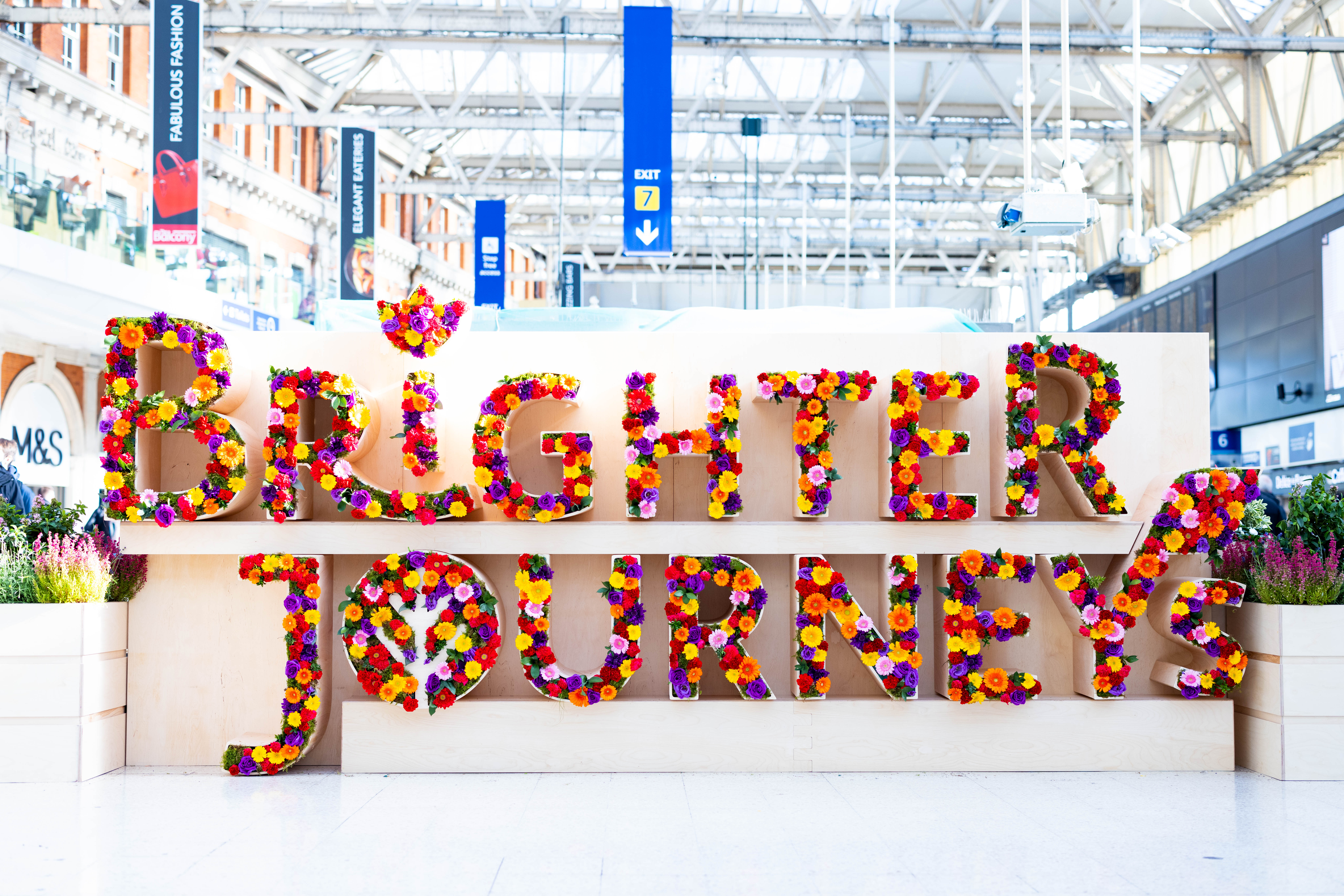 Brighter Journeys in bloom at stations