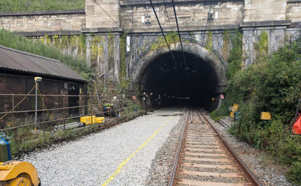 View of the Severn Tunnel from just outside the tunnel, with tracks in the foreground.